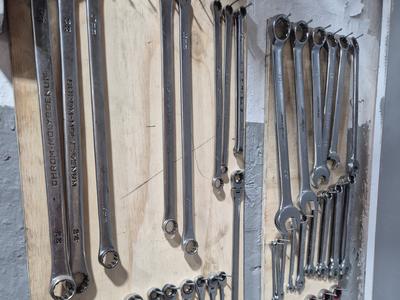 The workshop spanner board, ring and open-ended spanners hung by size